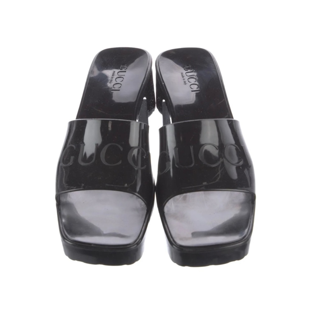 Gucci Rubber Slide Sandals.